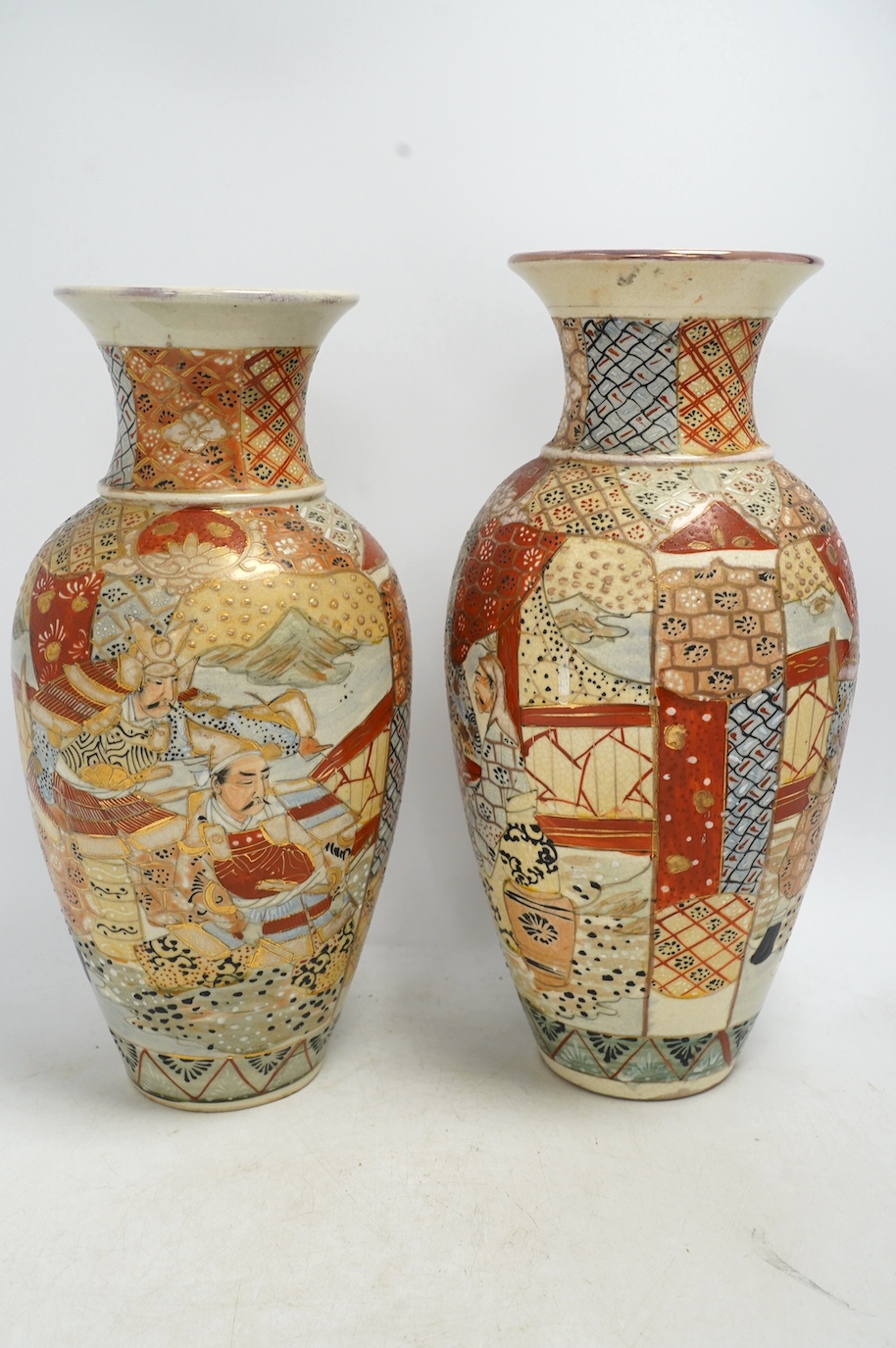 A pair of Japanese enamelled vases and a pair of brocaded Satsuma vases, tallest 32cm high., Condition - fair